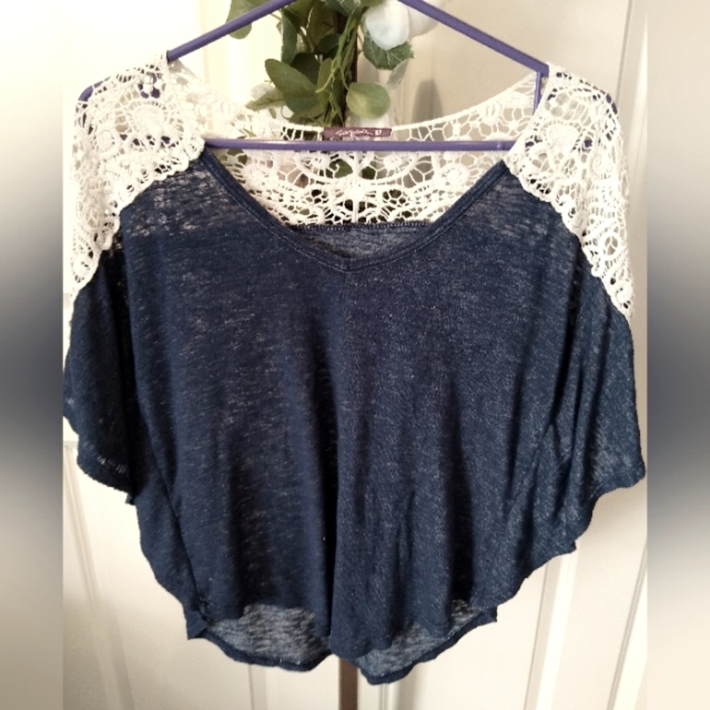 🥂 Beautiful romantic blue and lace top in great condition, size medium.